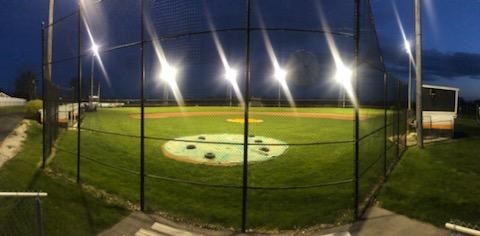 baseball diamond with lights on